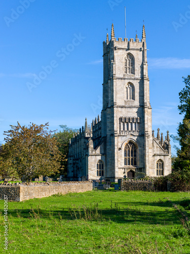 Saint Mary's Church Steeple Ashton. Mid shot.  Pretty country church surrounded by fields