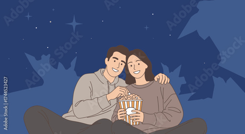 Couple Enjoying Movie And Popcorn Under Celestial Canopy On Romantic Evening