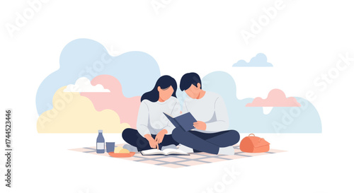 Couple Enjoying Outdoor Leisure Time Reading Book During Park Picnic In Sunny Day