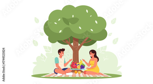 Couple Enjoying Pleasant Picnic Outdoors Under Large Tree on Sunny Day