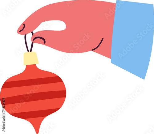 Hand Holding Christmas Toy