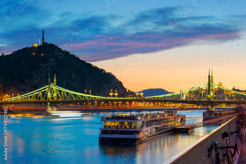 Evening view of Liberty bridge against Gellert hill in Budapest
