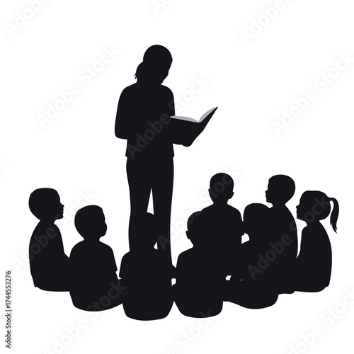 Silhouette of a Teacher Reading a Story to a Group of Children.
