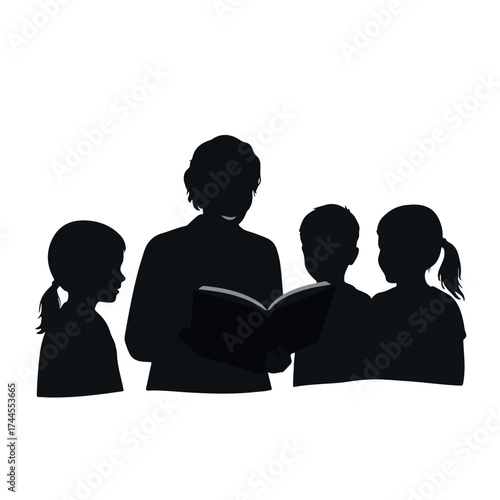Silhouette of a woman reading a book to three children.