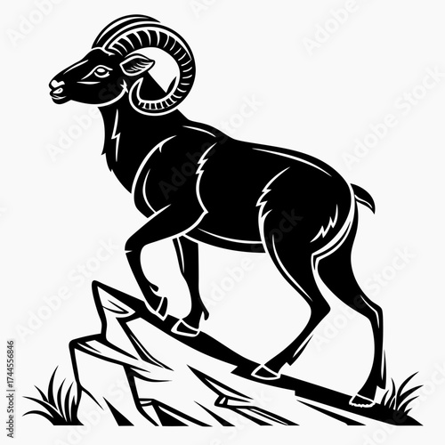 Majestic bighorn sheep standing proudly on rocky outcrop