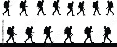 Silhouette of hikers walking in line with backpacks, outdoor trekking adventure, travel exploration, mountain hiking, camping, journey and exploration concept
