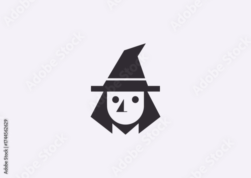 A minimalist witch silhouette logo, representing mystery, intuition, and creative magic