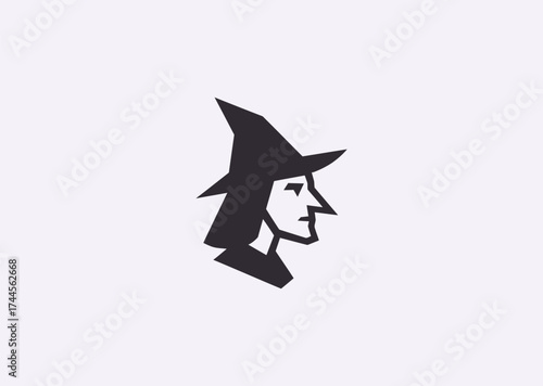 A minimalist witch silhouette logo, representing mystery, intuition, and creative magic