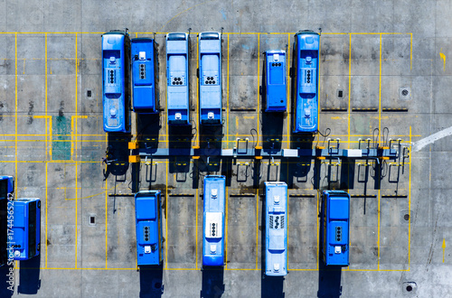 Aerial view of bus depot with electric charging station