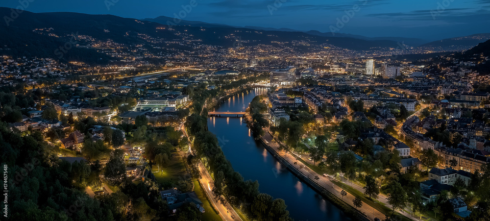 Fototapeta premium Night Cityscape Panorama: A mesmerizing night panorama of a vibrant city. Gleaming lights sparkle across the urban landscape.