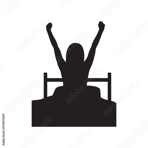 Silhouette of a woman waking up in bed with arms raised in celebration and victory depicting a fresh start and positive energy