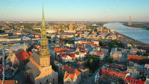 Riga, Latvia, Baltics. Beautiful panoramic aerial 4K video from flying drone to old Riga city on a summer sunset. (Series)