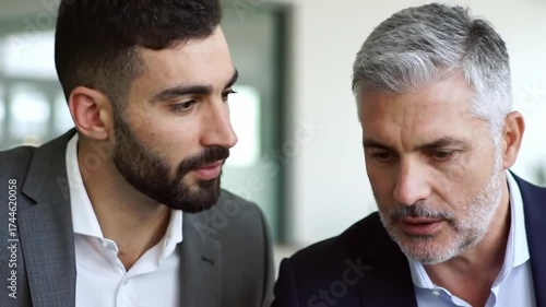 Two business professionals collaborating on an idea