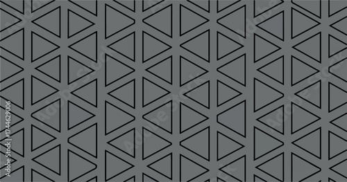 Geometric pattern of triangles creates a visually appealing design with repeating shapes.