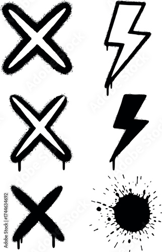 Graffiti art featuring crosses lightning bolts and ink splatters.