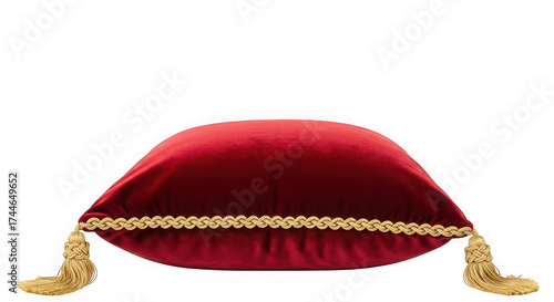 Red velvet cushion with golden tassels isolated on transparent background in studio