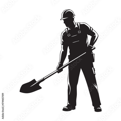 A silhouetted construction worker, wearing a hard hat and overalls, digs with a shovel, ready for manual labor.