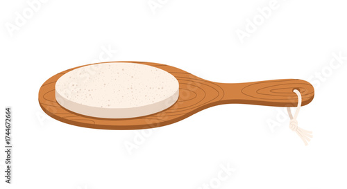 A natural wooden body brush with a circular exfoliating scrub pad attached to its surface for gentle skin care treatments.