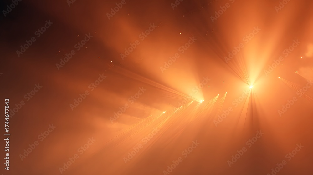 Obraz premium DJ booth Halloween event blurred glowing orange strobe beams cutting through fog