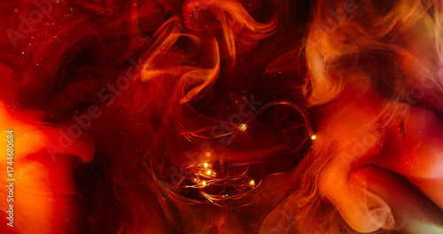Defocused garland illumination. Haze texture. Red orange smoke color ink stream. Cloud flare splash light bulb abstract black background.
