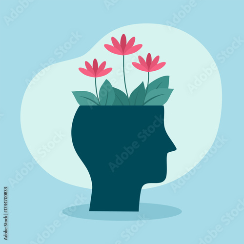 World mental health day concept. Human head with flowers inside.