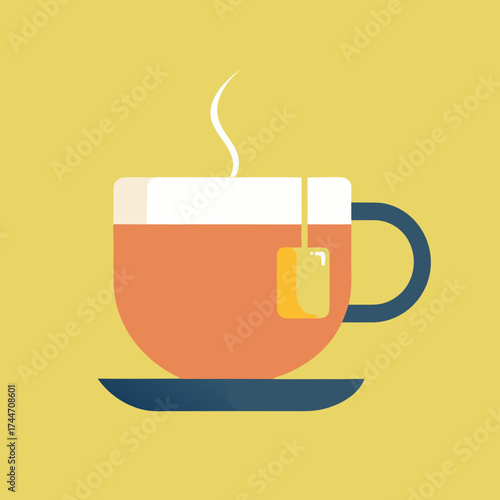 Steaming cup of tea with tea bag on a saucer