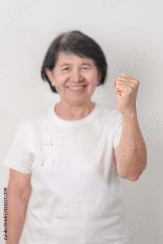 Wallpaper Mural Elderly with White ribbon for concept November Lung Cancer Awareness month, Stop Violence Against Women, Adoption, May Retinoblastoma, Action for Women Health, March Remembrance, October Osteoporosis Torontodigital.ca