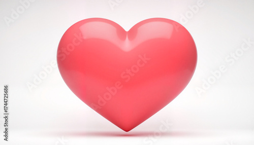 Glossy red heart shape on a light background, symbolizing love and affection