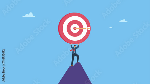 Success businessman holding big target with arrow hit bullseye center. Business target, aiming high goal, objective or purpose, skill or aspiration to achieve target, precision or accuracy.