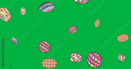 Digital animation of colorful decorative easter eggs icons falling against transparent background