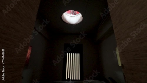 Architectural Light Well in Dark Interior