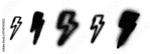 Set of graffiti lightning bolts in stipple art style with spray texture and grain shading. Abstract vector thunderbolt pack in black and white. Stipple art lightning elements for street art, poster 