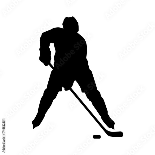 Silhouette of hockey player with stick and puck on ice
