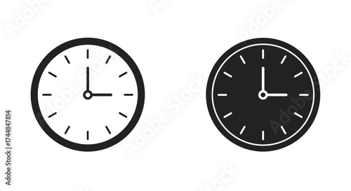 Two simple black and white analog clocks displayed facing forward