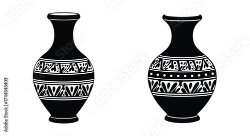 Two decorative black and white ceramic vases with geometric patterns