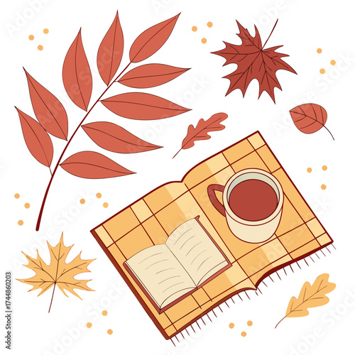 Cozy autumn scene with an open book a warm cup of coffee and fallen leaves on a checkered blanket
