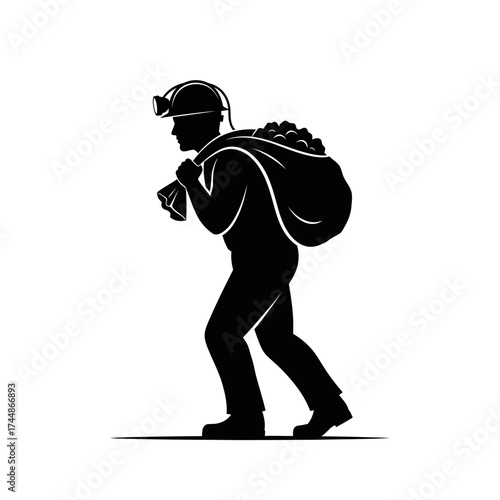 Silhouette of a miner carrying a heavy bag of coal on his back.