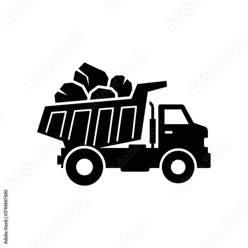Silhouette of a Dump Truck Carrying Rocks.