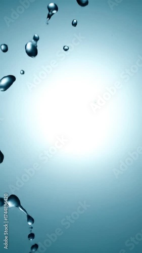 Water splash in slow motion, clear liquid, droplets, macro shot.