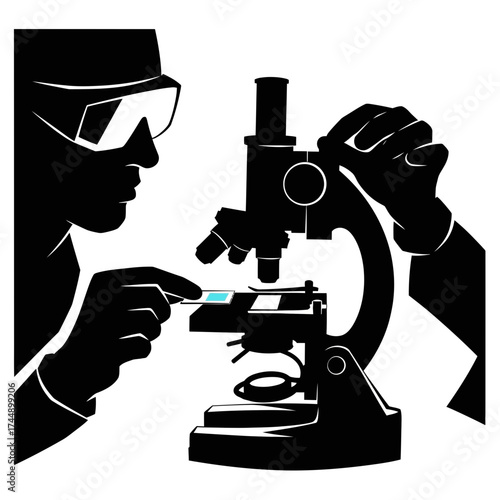 Silhouette of a Biologist Loading a Prepared Slide onto a Microscope Stage