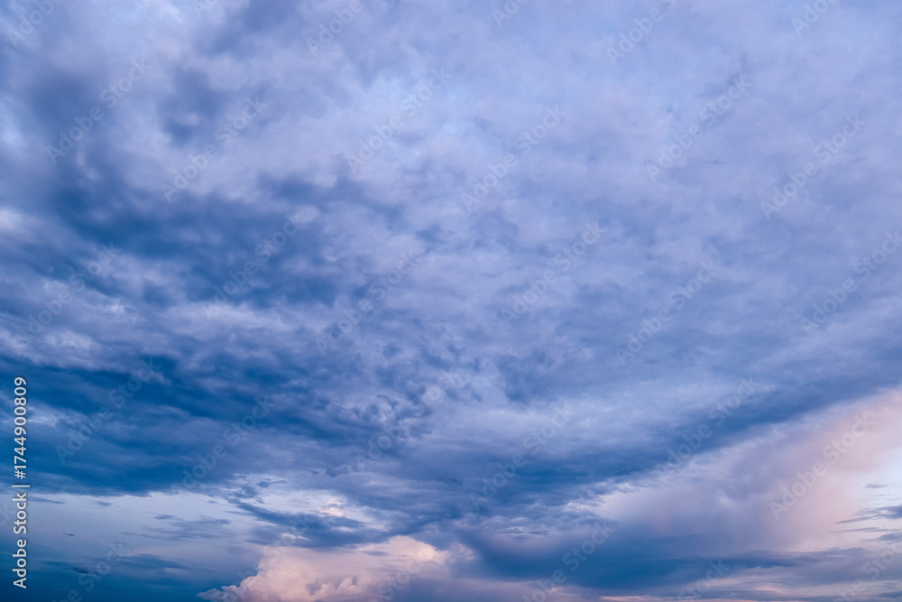 Naklejka premium Dark sky with stormy clouds. Dramatic sky rain,Dark clouds before a thunder-storm,clouds before rain