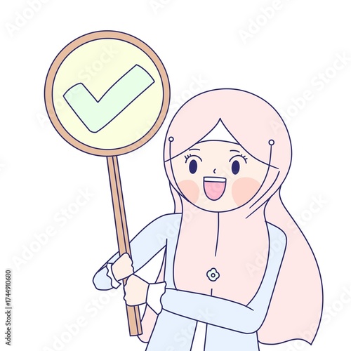 a muslim girl shows correct sign. a muslim girl shows check mark sign.