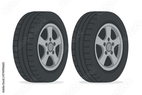 Pair of car tires with rims on white background