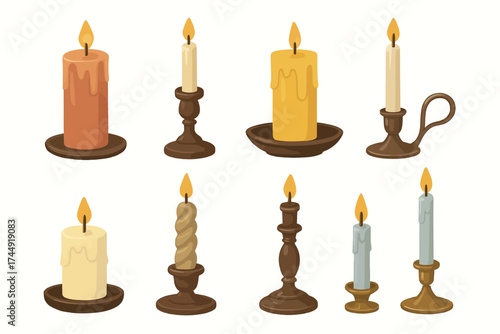 Collection of various candles in holders with burning flames