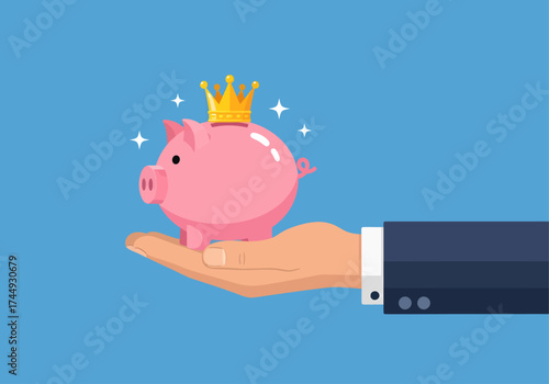 A professional's hand elevates the concept of personal savings to a royal status, presenting a pink piggy bank adorned with a sparkling golden crown.