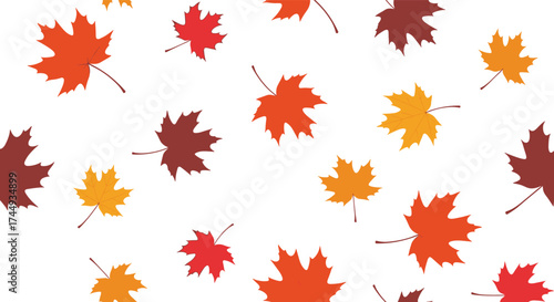 A pattern of colorful autumn leaves gently falling down.