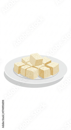 Cubes of tofu on a white plate for cooking or presentation  