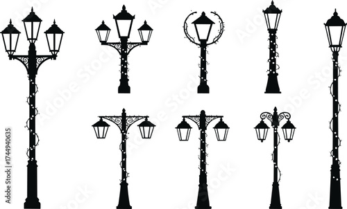 Vintage ornate street lamp silhouettes with climbing vines, decorative lantern posts, classic outdoor lighting, elegant urban design, architectural illumination elements