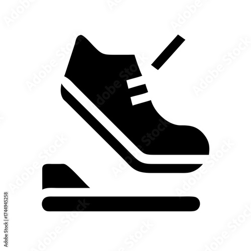 Running shoe on treadmill for fitness workout