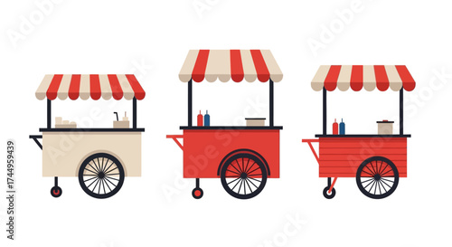 Three colorful food carts with striped awnings and wheels.